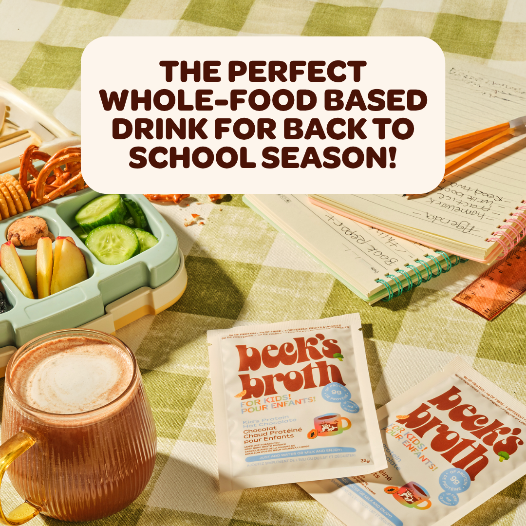 Back to school themed beverage scene with a cup of iced coffee, lunchbox, notebooks, and two packets of Beek's Broth on a green-and-white checkered tablecloth, with a large text banner reading 'THE PERFECT WHOLE-FOOD BASED DRINK FOR BACK TO SCHOOL SEASON!'.
